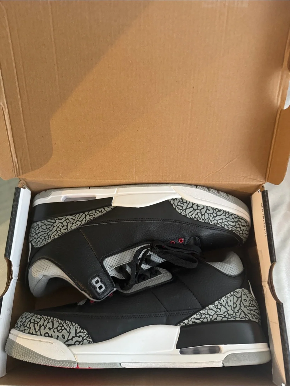 New! Air Jordan 3 Retro Black Cement sneaker featuring black leather!